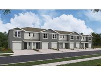 New townhome community with attached garages and attractive landscaping at 6620 Sw 81St Loop, Ocala, FL 34476