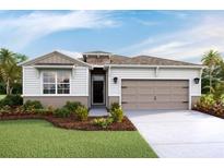 One-story home with two-car garage and landscaped yard at 4086 Nw 48Th Terrace Rd, Ocala, FL 34482