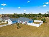 Newly built home with fenced backyard and spacious lot at 3321 Sw 153Rd Place Rd, Ocala, FL 34473
