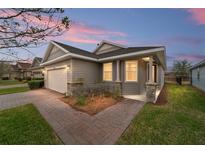 Attractive one-story home with a two-car garage and landscaped yard at 3977 Nw 46Th Ter, Ocala, FL 34482