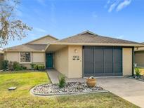 Cute one-story home with a two-car garage and well-maintained landscaping at 5032 Se 108Th St, Belleview, FL 34420