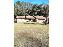 Ranch style home with a spacious yard at 2341 Ne 42Nd St, Ocala, FL 34479