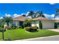 Single-story home with landscaped yard at 3093 Dunmore Dr, Lake Wales, FL 33859