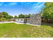 Newly renovated mid-century modern home with stone facade at 1004 Avenue G Ne, Winter Haven, FL 33881