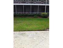 Well-maintained lawn in front of building at 1700 6Th Nw St # C7, Winter Haven, FL 33881