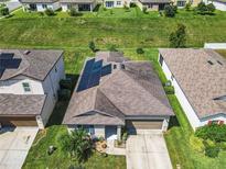 House with solar panels, visible from above at 278 Alford Dr, Davenport, FL 33896