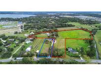 Aerial view showing property lines and surrounding area at 1957 Rifle Range Rd, Winter Haven, FL 33880
