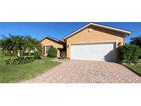 Single-Gathering home with two-car garage and landscaped yard at 4152 Aberdeen Ln, Lake Wales, FL 33859