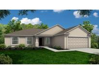 New single-story home with two-car garage and landscaping at 1216 Caloosa Ridge Ave, Babson Park, FL 33827