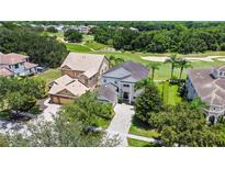 Two-story home with a golf course view at 1217 Radiant St, Reunion, FL 34747