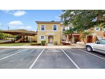 Two-story townhome with playground and parking at 1135 Park Ridge Cir, Kissimmee, FL 34746