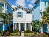 Charming two-story home with gray and white siding at 3044 Salted Rim Rd, Kissimmee, FL 34747