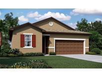 One-story home with brown garage door and red shutters at 3116 Kacee Dr, Eagle Lake, FL 33839