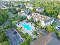 Community pool and surrounding apartment buildings at 3593 Conroy Rd # 437, Orlando, FL 32839