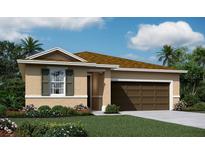 One-story home with two-car garage and landscaping at 636 Hennepin Loop, Lake Wales, FL 33898