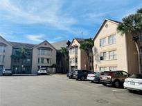 Condo building with ample parking at 3100 Parkway Blvd # 712, Kissimmee, FL 34747