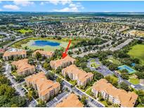 Aerial view showcasing building location and surrounding amenities at 7671 Comrow St # 202, Kissimmee, FL 34747