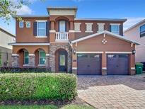 Beautiful two-story home with landscaping at 341 Lasso Dr, Kissimmee, FL 34747