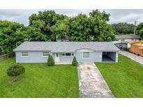 Ranch style home with a large front yard at 1721 Bellgrove St, Lakeland, FL 33805