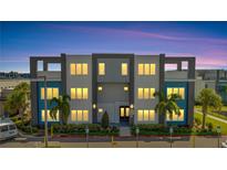 Modern building exterior with balconies and parking at 7770 Sandy Ridge Dr # 201, Reunion, FL 34747