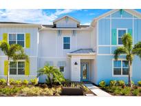 Beach-style townhouses with colorful exteriors at 2980 On The Rocks Pt, Kissimmee, FL 34747