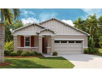 Beautiful craftsman style home with red accents and a two-car garage at 196 Flag Lilly Ln, Umatilla, FL 32784