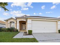 One-story home with two-car garage at 1104 Bloomingdale Dr, Davenport, FL 33897