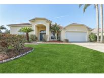 Single-Gathering home with two-car garage and well-manicured lawn at 805 Via Bianca Dr, Davenport, FL 33896