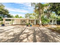 Charming single story home with carport and paver driveway at 4321 Rummell Rd, St Cloud, FL 34769