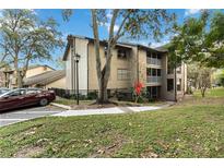Two-story building with balconies and landscaping at 976 Leeward Pl # 102, Altamonte Springs, FL 32714