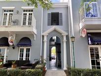 Building exterior showcasing the entrance and nearby businesses at 660 Celebration Ave # 260, Kissimmee, FL 34747