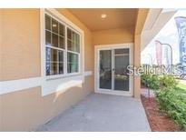 Bright and spacious back patio with sliding glass doors at 1589 Cumin Dr, Kissimmee, FL 34759
