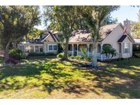 Charming single story home with a spacious lawn and mature trees at 1109 Lakeshore Blvd, St Cloud, FL 34769