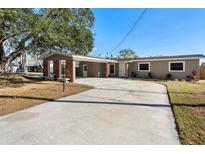 Updated single story home with covered carport and landscaped yard at 201 Edgewater Dr, St Cloud, FL 34769