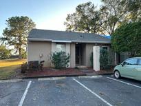 Cute condo with parking and a small yard at 949 Pebble Creek Cir, Orlando, FL 32824