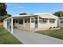 Charming single-wide manufactured home with carport at 1610 Reynolds Rd # 5, Lakeland, FL 33801