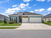 Beautiful two-story house with a three-car garage at 7474 Sw 78Th Ter, Ocala, FL 34481