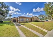 House exterior: Brick ranch with double driveway at 312 E Broadway, Fort Meade, FL 33841