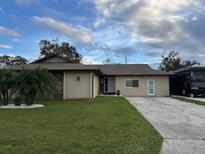 Single-story home with landscaped lawn at 3234 Bonnybrook S Dr, Lakeland, FL 33811