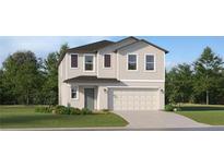 Two-story house with light beige siding, dark gray roof, and a two-car garage at 1240 Deepwater Cir, Eagle Lake, FL 33839