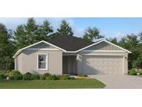 New single-story home with gray siding, a two-car garage, and landscaping at 1310 Deepwater Cir, Eagle Lake, FL 33839