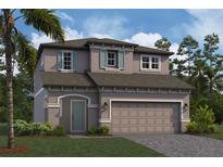 Two-story house with gray siding, light teal door, and a two-car garage at 4897 Foxglove Dr, Lakeland, FL 33811