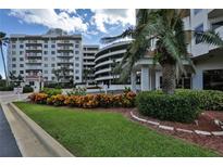 Exterior view of the building and landscaping at 3 Oceans West Blvd # 5C4, Daytona Beach Shores, FL 32118