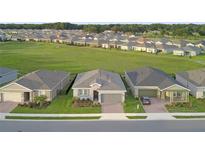 Aerial view of three homes in a residential area at 4359 Nw 54Th Ter, Ocala, FL 34482