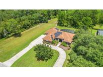 Aerial view of home showcasing large yard at 2666 Winnemissett Oaks Dr, Deland, FL 32724