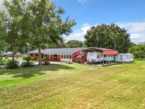 Ranch home with RV carport and storage shed at 106 N Frederick St, Pierson, FL 32180