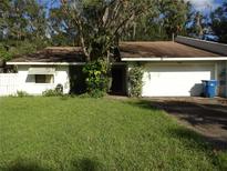 One-story home with attached garage and lawn at 770 Lancaster Rd, Deland, FL 32720