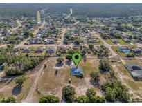 Aerial view showing the house's location in a residential neighborhood at 3190 Lori Ct, Deltona, FL 32738