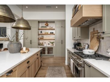Modern kitchen with large island and cabinetry at 3149 S Prospector Cir, Gold Canyon, AZ 85118