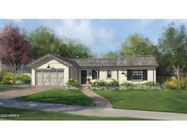 Craftsman style home exterior with two car garage and landscaped yard at 3942 E Penedes Dr, Gilbert, AZ 85298